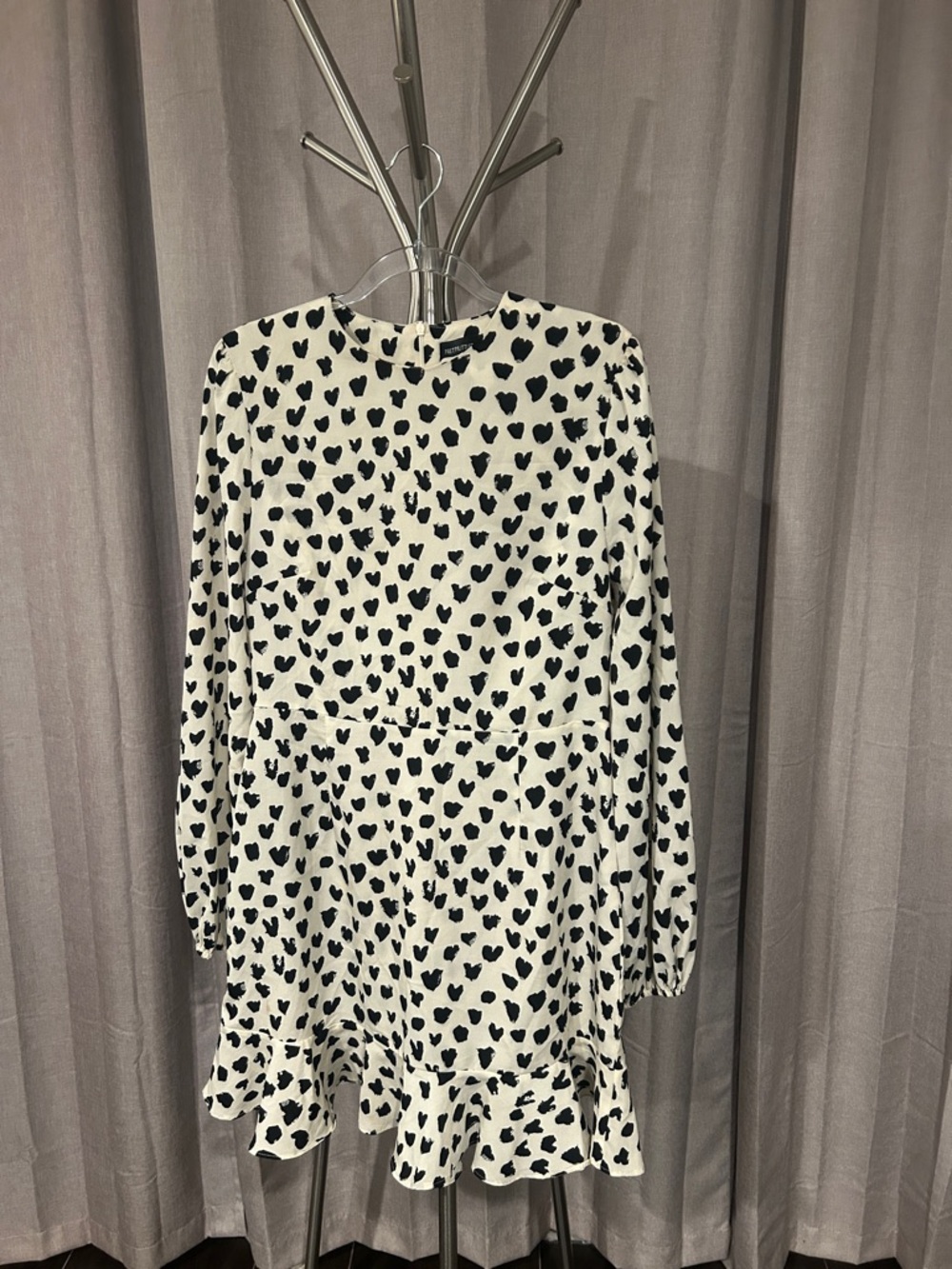 PrettyLittleThing White Dress with Black abstract looking hearts.